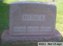 Martha F Medick