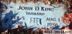 John D King