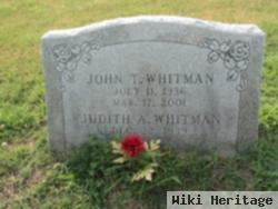 John T "tiny" Whitman