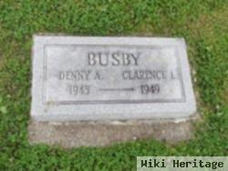 Clarence L. Busby