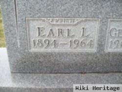 Earl L Shick