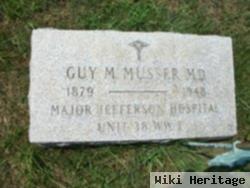 Dr Guy M. Musser