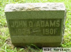 John D Adams