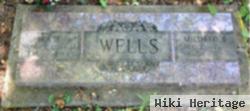 Mildred E. Wells