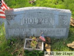 Albert W Holtzer