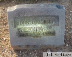 John D Dobbins