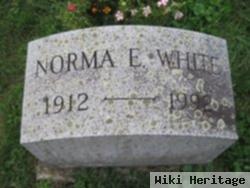 Norma E White