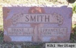 Frank E Smith