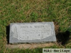 John K. Malek