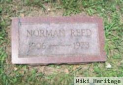 Norman E Reed