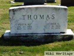 Justa M. Thomas