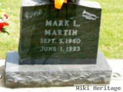 Mark L. Martin