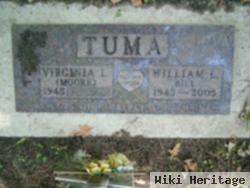 William E Tuma