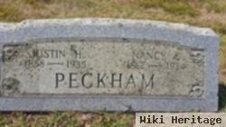 Justin H Peckham