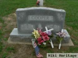 James E Cooper