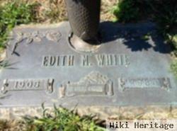 Edith M White