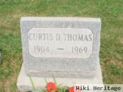 Curtis D Thomas