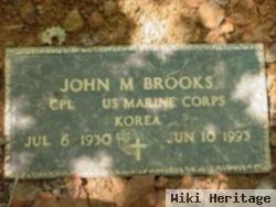 Corp John M. Brooks