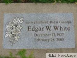 Edgar W White