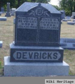 John R Devericks