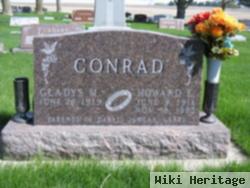 Howard E Conrad