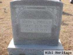 John L Priest