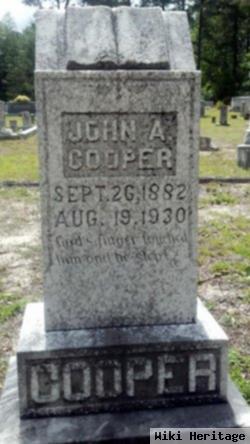 John A Cooper