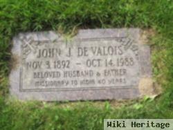 Dr. John J De Valois