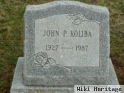 John P Koliba