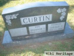 Gerald J Curtin