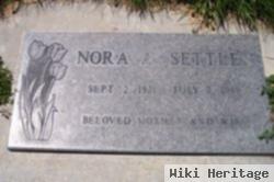 Nora A. Settles