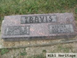 Martha J Travis