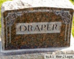 Raleigh E Draper