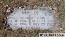 John E. Malik