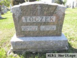 Joseph V Toczek