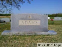 Arthur K Adams