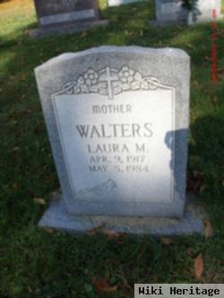 Laura M Walters