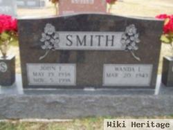 John F Smith