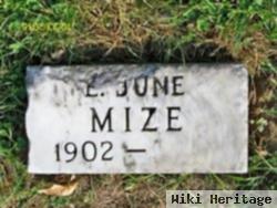 E. June Mize