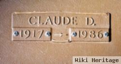 Claude D Carl