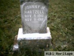 Johnny M Hartzell