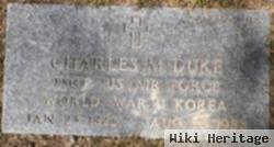 Charles M Duke