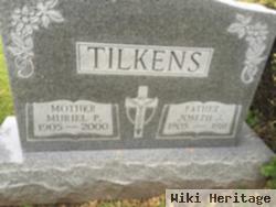 Muriel P Tilkens