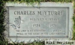 Charles M Yturri
