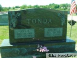 Lois E. Tonda