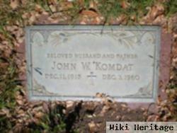 John W. Komdat