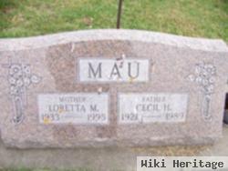 Cecil H Mau