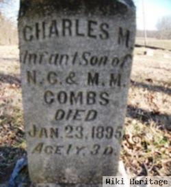 Charles M Combs