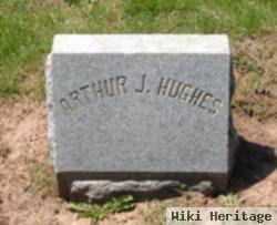 Arthur J Hughes