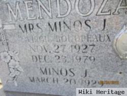 Minos J Mendoza